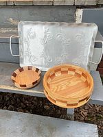 Front view of aluminum tray and both wood bowls