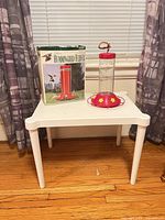 Feeder, box, and side table together