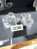 Both clear glass blossom vases top view
