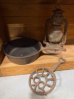 Group shot showing skillet, lantern and trivet together