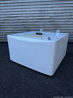 Front and side view of closed white Electrolux pedestal