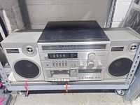 Full Emerson MC1500 stereo with detachable speakers and turntable
