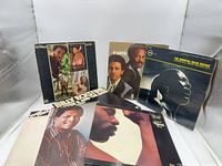 Six LP covers displayed upright and flat, showing mix of jazz and soul titles