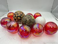 Group of 11 decorative spheres in various materials