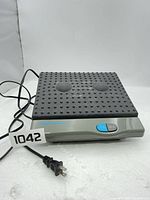 Overall view of Sharper Image Acuvibe massager with power cord