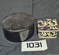 Both boxes side by side with lot number card visible
