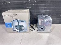 Pasta maker and retail box side by side showing overall lot contents