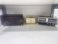 Front view of all three devices on shelf