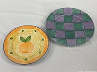 Both plates front view showing designs