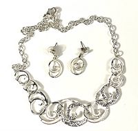 Full view of necklace and earrings showing overall design
