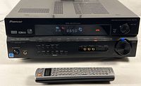 Front view of Pioneer receiver with remote