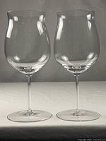 Front view showing both Riedel crystal wine glasses