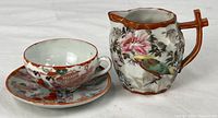 Cup, saucer, and creamer group shot