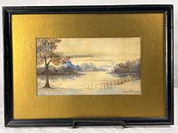 Front view of framed watercolor landscape showing artwork, mat and frame