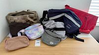 All eight bags displayed on tabletop