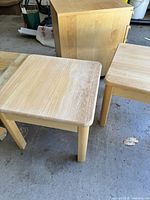 Kitchen table top, end tables, file cabinet visible