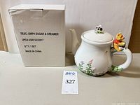 Boxed sugar & creamer beside teapot