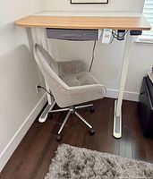 Standing desk and chair set showing overall appearance
