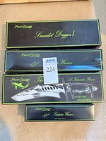 All four Frost Cutlery boxes stacked showing model names