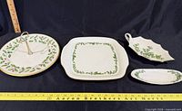 All four Lenox Holly & Berry pieces with ruler for scale