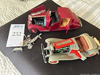 Both cars with detached parts visible