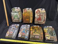 Front view of seven sealed Marvel Legends figures in blister packages