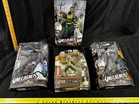 Front view of four boxed Marvel Legends figures: Doctor Octopus, Green Goblin, Xorn, Black Costume Spider-Man