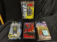 Front view of the four packaged action figures