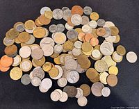 Overall pile of mixed coins showing variety