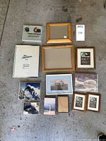 All twelve frames laid out showing variety of sizes and materials