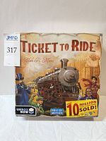 Front of sealed Ticket to Ride box showing title and shrink wrap