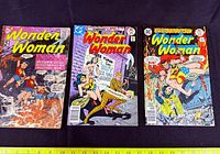 Front covers of all three Wonder Woman issues displayed side by side