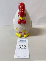 Front view of ceramic rooster coin bank with lot number visible