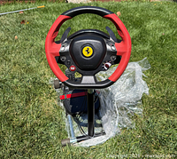 Front view of Ferrari 458 Spider racing wheel mounted on stand