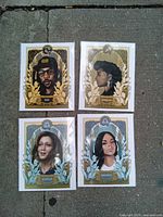 Four prints showing Cancer, Aries, Libra (two variations) on pavement background