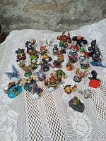 All Skylanders figures laid out on cloth backdrop