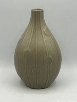 Front view of taupe-gray Jonathan Adler Pot a Porter vase