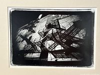 Close-up of black and white photograph showing fire escape composition within mat