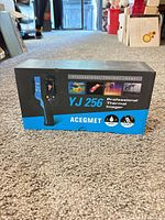 Front of box showing ACEGMET YJ256 thermal imager and branding