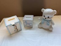 Overall view of three ceramic coin banks