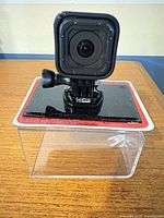 Front view of GoPro HERO4 Session mounted on adhesive base
