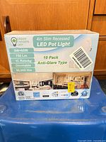 Front of box showing product name, size, wattage, quantity