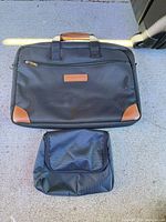 Front view of laptop briefcase and accessory pouch