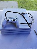 Console, controller and power cord top view