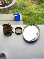 Group shot of vanity tray, brass bowl and letter holder