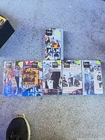 All six VHS volumes laid out showing front artwork and wear