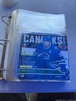 Binder sleeve showing Henrik Sedin cover program