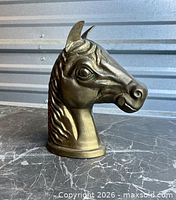 Front angle of brass horse head bust
