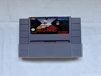 Front of Zone SNES cartridge showing label art and dust cover