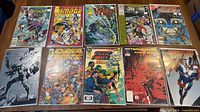 Ten comics including Catwoman, Inside Image, Cyber Force, The Terminator